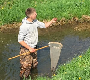 Student with a net